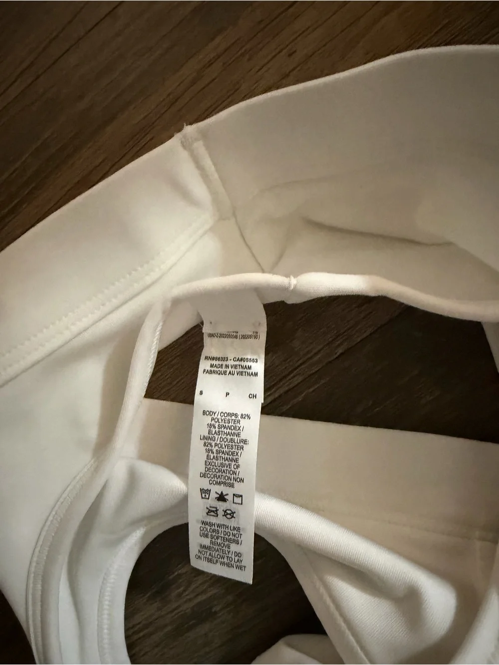 Nike White Racerback Sports Bra with Black Swoosh